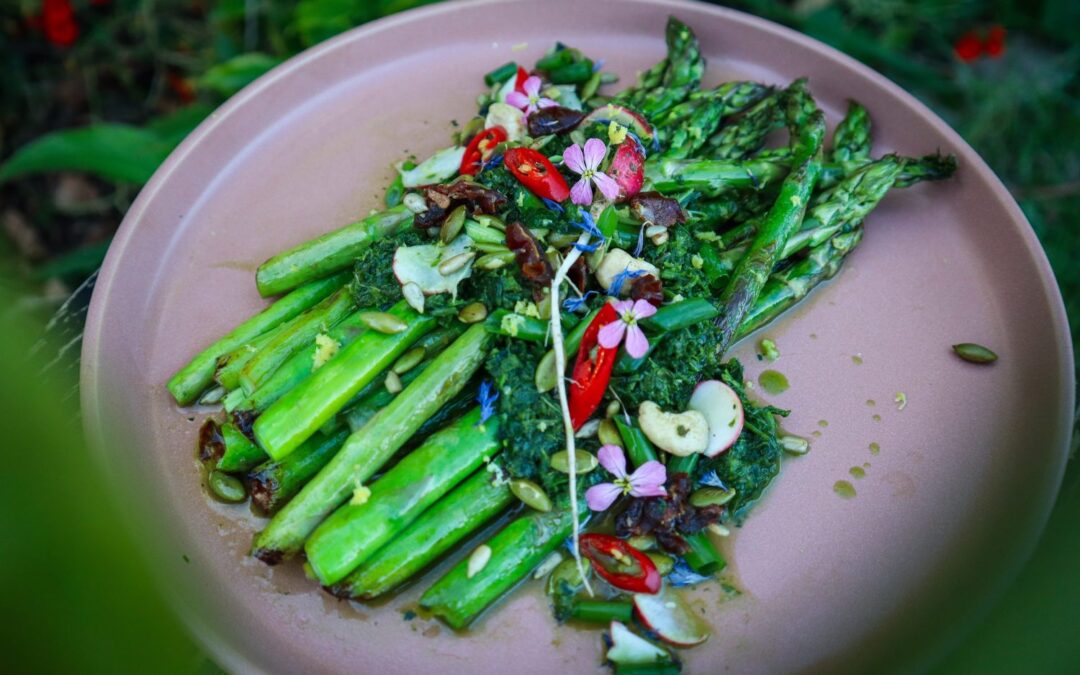 Asparagus with Radish Top Chimichurri, toasted Seeds and Dates